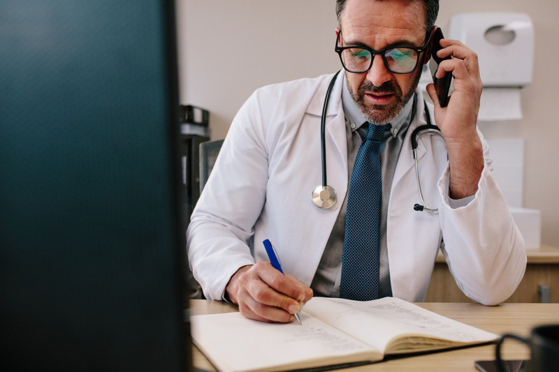 Doctor on phone