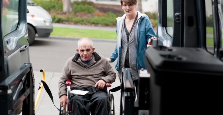 Wheelchair user using an adapted vehicle