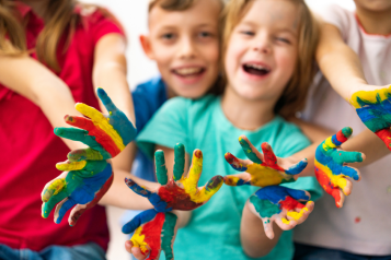 Children with painted hands