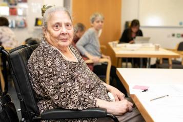 elderly woman in wheelchair