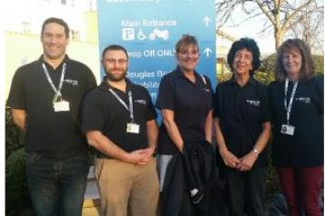 volunteers stood outside Queen Mary's Hospital