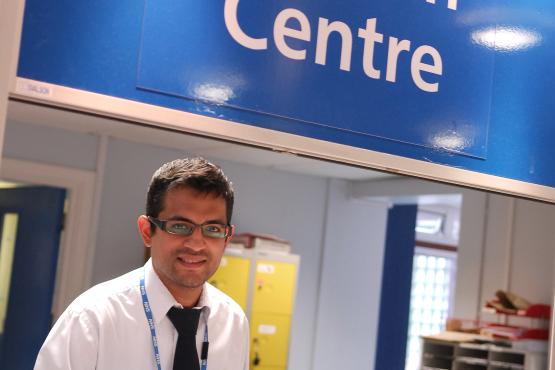 staff at reception of walk in centre