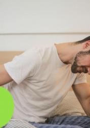 Title image saying "Living with Long Covid" and "report out now", showing a man sat in bed, holding his head in discomfort.